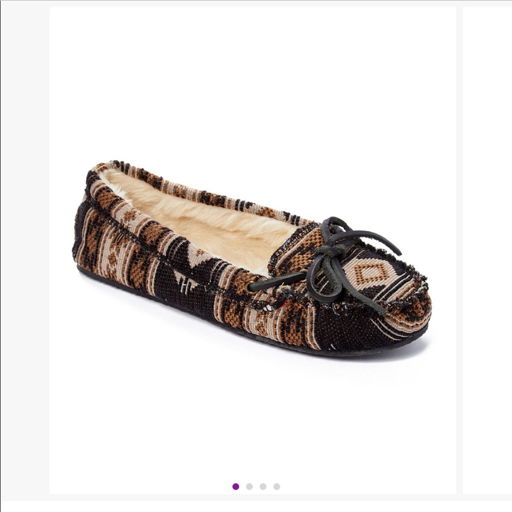 Minnetonka slippers never worn